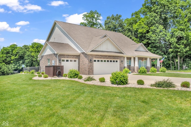 9231 E Poynter Dr, Morgantown, IN 46160 - craftsman-style house featuring brick siding, an attached garage, a front yard, driveway, and a shingled roof