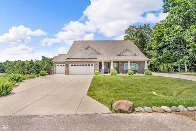 9231 E Poynter Dr, Morgantown, IN 46160 - craftsman-style home with concrete driveway, an attached garage, a front yard, brick siding, and covered porch
