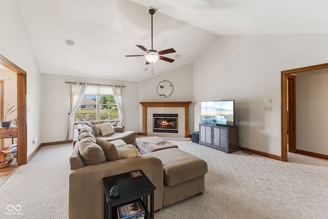 6629 Woodcrest Dr, Avon, IN 46123 - living room featuring ceiling fan, a tile fireplace, light colored carpet, and high vaulted ceiling