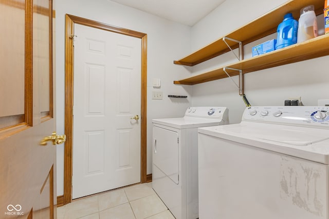 6629 Woodcrest Dr, Avon, IN 46123 - washroom featuring washer and dryer and light tile patterned floors