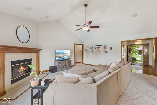 6629 Woodcrest Dr, Avon, IN 46123 - living room with light colored carpet, a fireplace, ceiling fan, and high vaulted ceiling