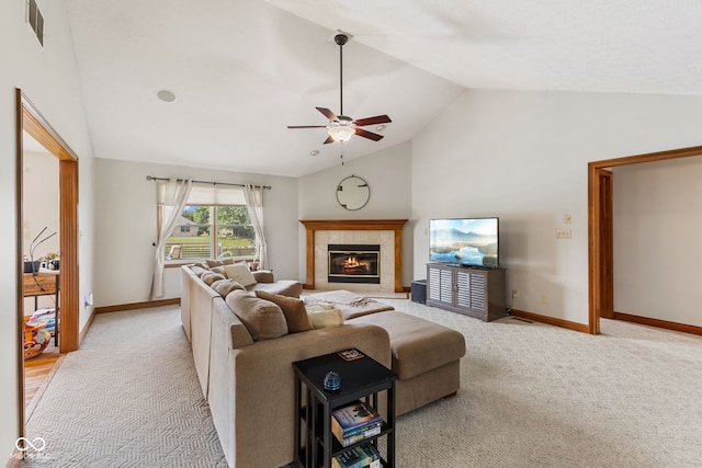 6629 Woodcrest Dr, Avon, IN 46123 - living area featuring light carpet, a ceiling fan, a tile fireplace, and high vaulted ceiling