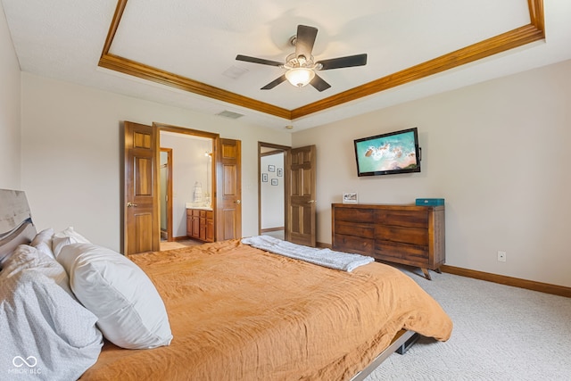 6629 Woodcrest Dr, Avon, IN 46123 - bedroom with a raised ceiling, light colored carpet, crown molding, a ceiling fan, and connected bathroom