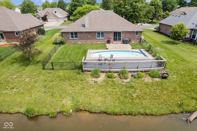 6629 Woodcrest Dr, Avon, IN 46123 - back of property with brick siding, roof with shingles, and a water view