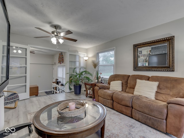 1532 E Markwood Ave, Indianapolis, IN 46227 - living room with wood finished floors and a ceiling fan