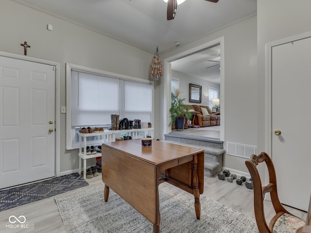 1532 E Markwood Ave, Indianapolis, IN 46227 - dining space with a ceiling fan, wood finished floors, and ornamental molding