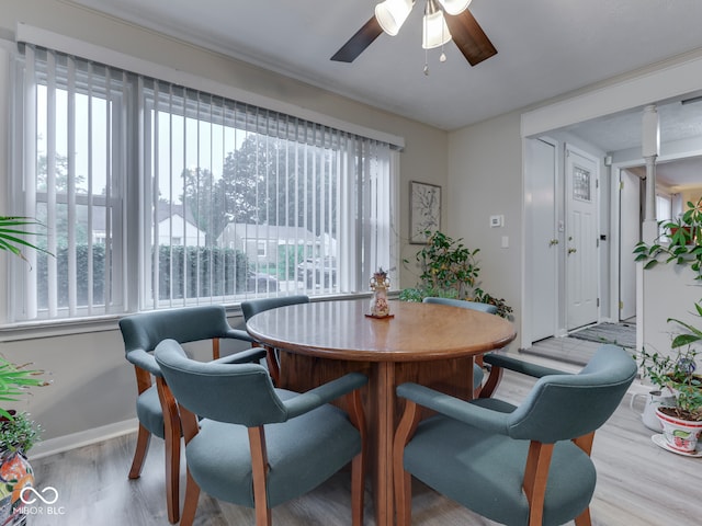 1532 E Markwood Ave, Indianapolis, IN 46227 - dining area featuring a ceiling fan and wood finished floors
