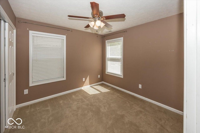 2325 N Talbott St, Indianapolis, IN 46205 - carpeted empty room with a ceiling fan and a textured ceiling