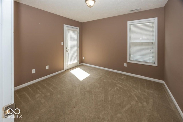 2325 N Talbott St, Indianapolis, IN 46205 - carpeted spare room featuring baseboards