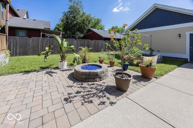 2325 N Talbott St, Indianapolis, IN 46205 - view of patio / terrace featuring an outdoor fire pit