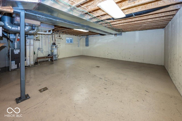 2325 N Talbott St, Indianapolis, IN 46205 - unfinished basement featuring water heater, electric panel, and heating unit