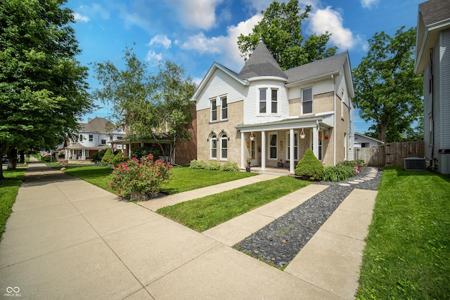 426 N Franklin St, Greensburg, IN 47240 - victorian house with a porch and brick siding