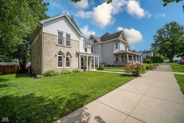 426 N Franklin St, Greensburg, IN 47240 - view of front of house with brick siding and covered porch