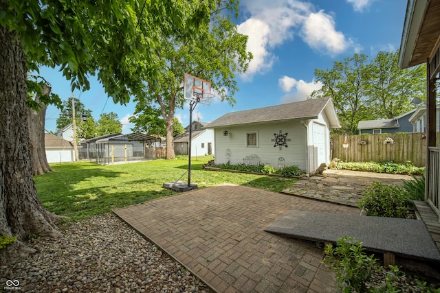 426 N Franklin St, Greensburg, IN 47240 - fenced yard with an outbuilding and a patio area