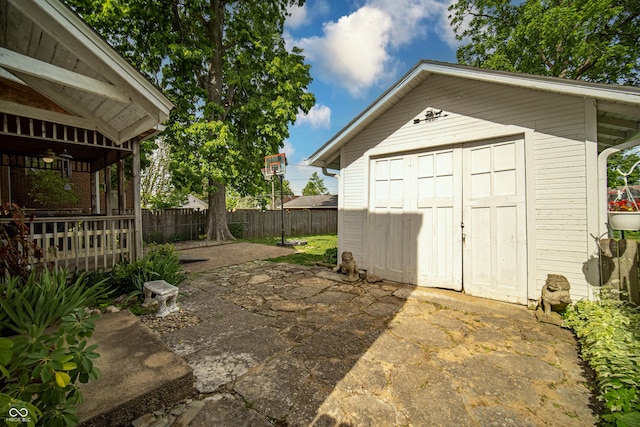 426 N Franklin St, Greensburg, IN 47240 - fenced backyard featuring a storage shed and a patio area