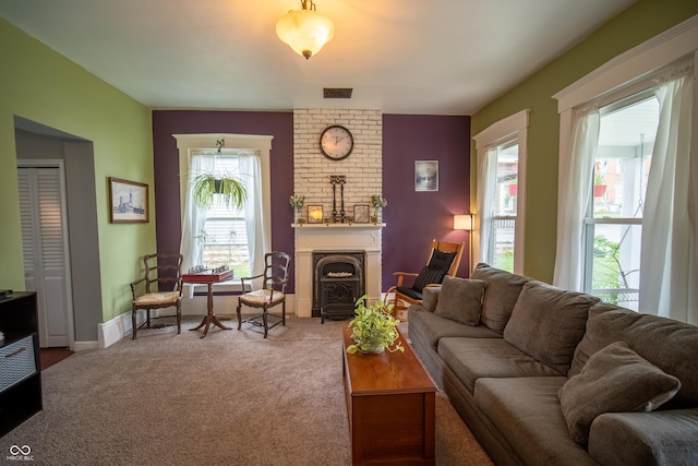 426 N Franklin St, Greensburg, IN 47240 - living room featuring carpet flooring and a fireplace