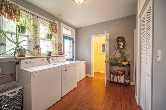 426 N Franklin St, Greensburg, IN 47240 - washroom with separate washer and dryer and light wood-style flooring