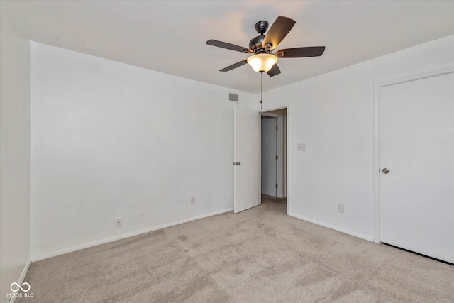10016 Penrith Dr, Indianapolis, IN 46229 - unfurnished bedroom featuring carpet flooring and a ceiling fan