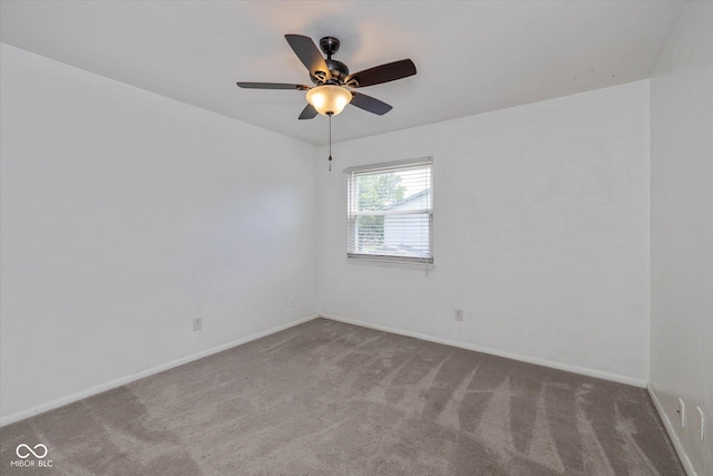 10016 Penrith Dr, Indianapolis, IN 46229 - carpeted spare room with ceiling fan and baseboards