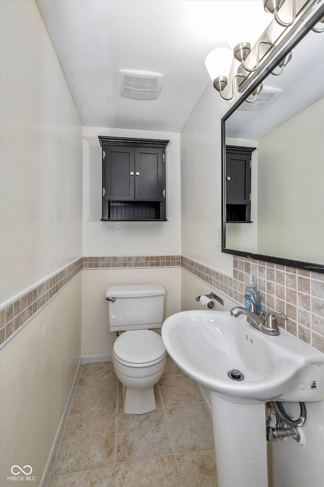 10016 Penrith Dr, Indianapolis, IN 46229 - bathroom featuring toilet and tile patterned floors