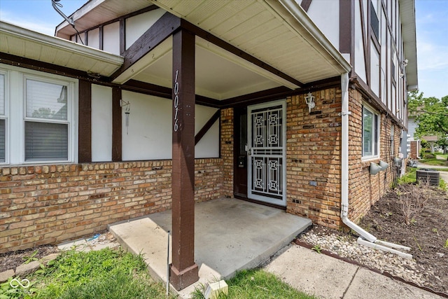 10016 Penrith Dr, Indianapolis, IN 46229 - doorway to property with brick siding