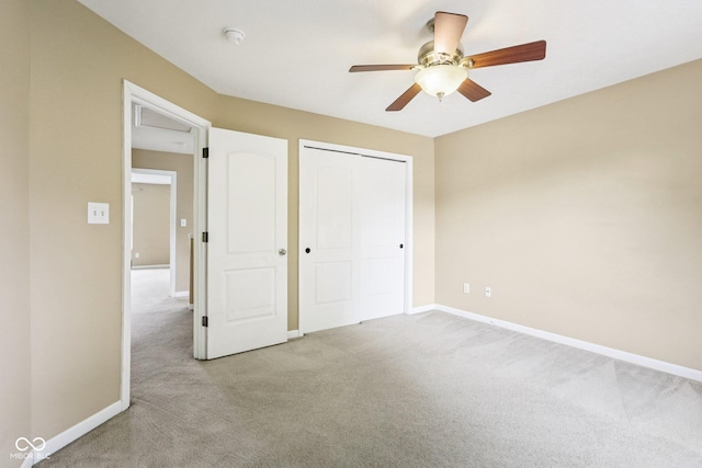 1138 Topp Creek Dr, Indianapolis, IN 46214 - unfurnished bedroom featuring light colored carpet, a closet, and ceiling fan