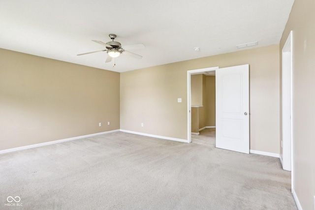 1138 Topp Creek Dr, Indianapolis, IN 46214 - spare room with ceiling fan and light colored carpet