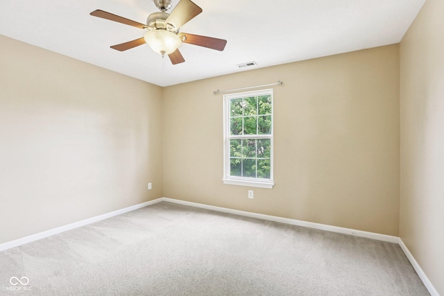 1138 Topp Creek Dr, Indianapolis, IN 46214 - spare room with light colored carpet and a ceiling fan