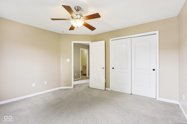 1138 Topp Creek Dr, Indianapolis, IN 46214 - unfurnished bedroom featuring light carpet, a closet, and ceiling fan