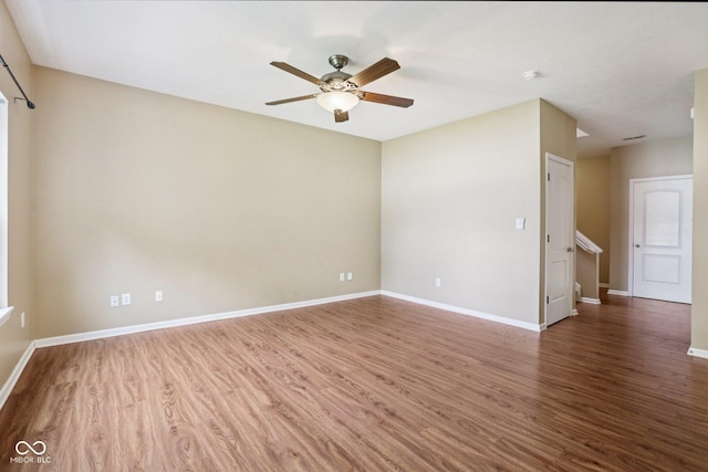 1138 Topp Creek Dr, Indianapolis, IN 46214 - empty room with wood finished floors and ceiling fan