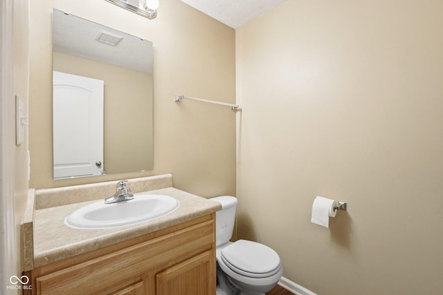 1138 Topp Creek Dr, Indianapolis, IN 46214 - bathroom featuring toilet and vanity