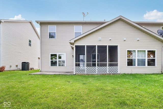 1138 Topp Creek Dr, Indianapolis, IN 46214 - rear view of house with a yard and a sunroom