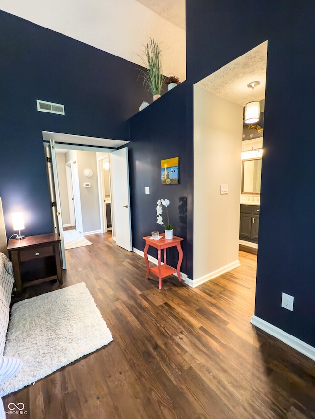 7470 Charrington Ct, Indianapolis, IN 46254 - hallway with a towering ceiling and wood finished floors