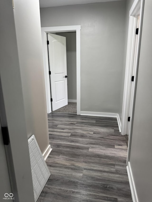 1006 Hurricane St, Franklin, IN 46131 - hallway featuring baseboards and dark wood-style floors