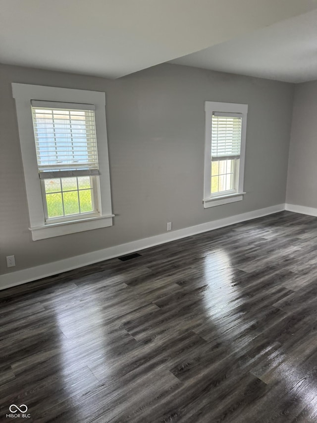 1006 Hurricane St, Franklin, IN 46131 - spare room featuring healthy amount of natural light and dark wood-style floors