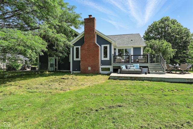 17138 Joliet Rd, Westfield, IN 46074 - back of property with a wooden deck, a chimney, a lawn, and a shingled roof
