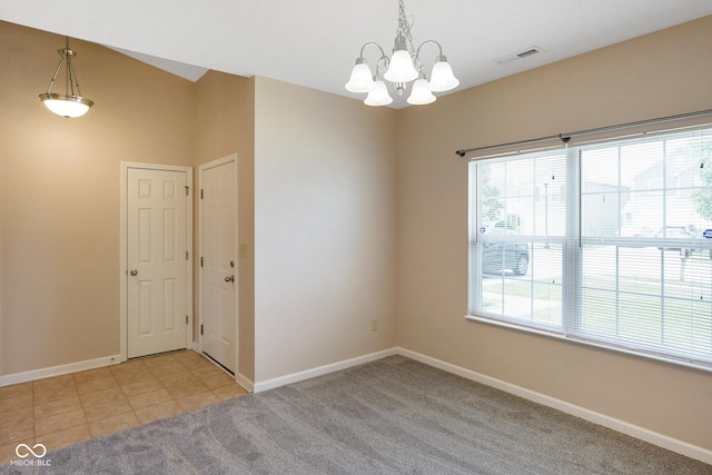 7715 Bolero Dr, Camby, IN 46113 - empty room featuring a chandelier and light colored carpet