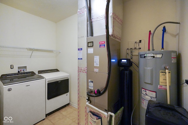7715 Bolero Dr, Camby, IN 46113 - laundry area with washer and dryer, electric water heater, heating unit, and light tile patterned floors