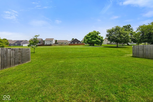 7715 Bolero Dr, Camby, IN 46113 - view of yard featuring a residential view