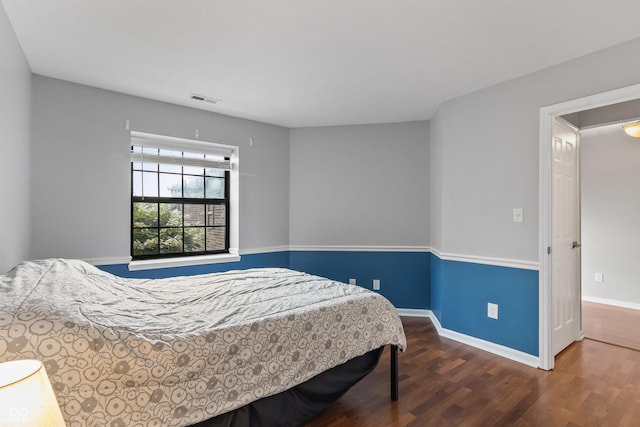 7616 Derrek Pl, Indianapolis, IN 46219 - bedroom with wood finished floors and baseboards
