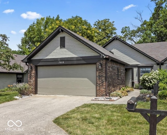 7616 Derrek Pl, Indianapolis, IN 46219 - single story home with brick siding, an attached garage, and concrete driveway