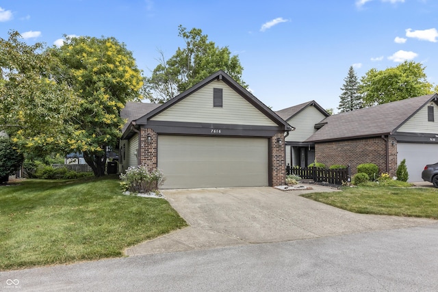 7616 Derrek Pl, Indianapolis, IN 46219 - single story home with brick siding, an attached garage, and driveway