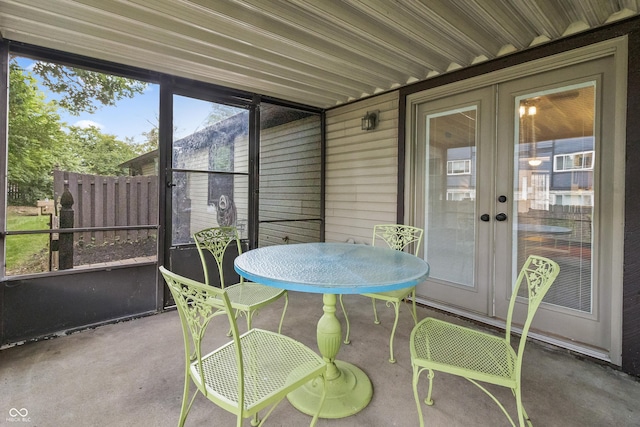 7616 Derrek Pl, Indianapolis, IN 46219 - sunroom featuring outdoor dining space and french doors