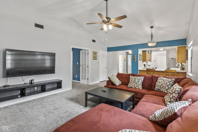 7616 Derrek Pl, Indianapolis, IN 46219 - living area featuring ceiling fan, carpet, and high vaulted ceiling
