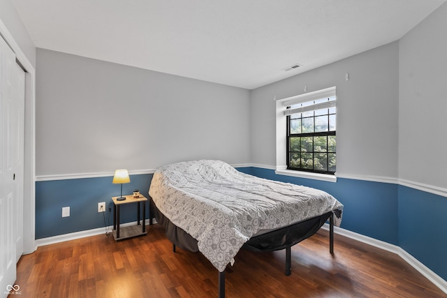 7616 Derrek Pl, Indianapolis, IN 46219 - bedroom with a closet and wood finished floors