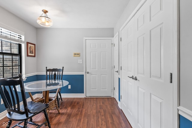 7616 Derrek Pl, Indianapolis, IN 46219 - dining area featuring baseboards and dark wood-style floors