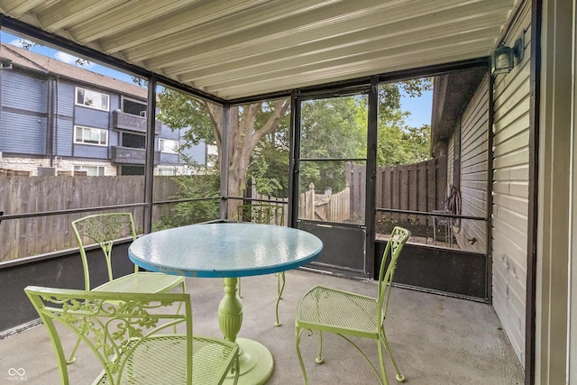 7616 Derrek Pl, Indianapolis, IN 46219 - sunroom / solarium featuring outdoor dining area