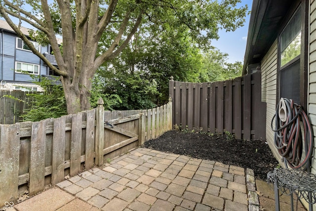 7616 Derrek Pl, Indianapolis, IN 46219 - view of patio with a gate