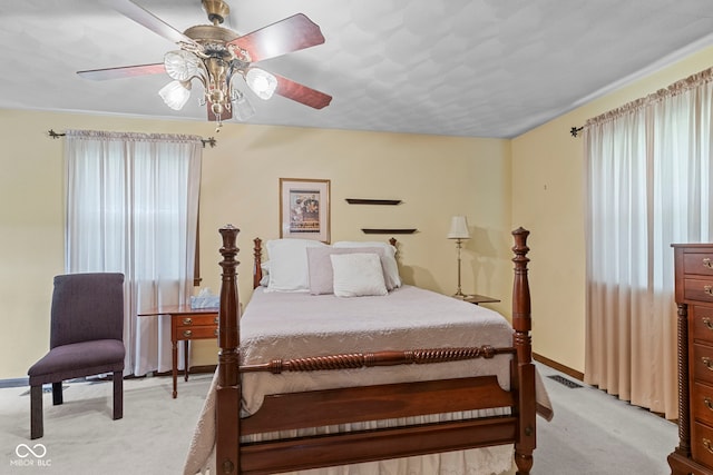 3249 N Slab Rd, Austin, IN 47102 - bedroom with light colored carpet and a ceiling fan