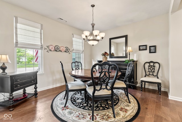 13327 Hockley Dr, Fishers, IN 46037 - dining area featuring a chandelier and hardwood / wood-style flooring